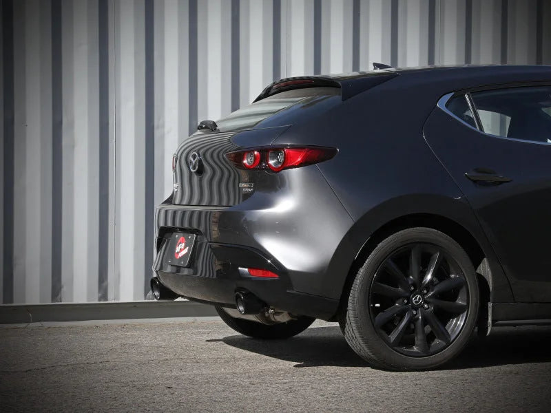 aFe 19-22 Mazda 3 L4 2.5L Takeda 3in to 2-1/2in 304 Stainless Steel Axle-Back Exhaust w/ Black Tip - Side View