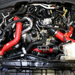 Load image into Gallery viewer, aFe 20-23 Ford Explorer ST V6 3.0L (tt) BladeRunner Aluminum Hot and Cold Charge Pipe Kit - Red - Side View