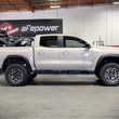 Load image into Gallery viewer, aFe CONTROL 23-24 Chevrolet Colorado ZR2 / GMC Canyon AT4X L4 2.7L (t) 1.25in Leveling Kit - Red - Side View