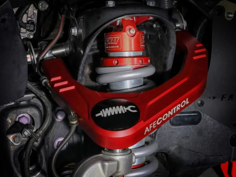 aFe Control 05-23 Toyota Tacoma Upper Control Arms - Red Anodized Billet Aluminum - Side View