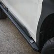 Load image into Gallery viewer, aFe POWER 20-23 Subaru Outback H4 2.4L (t) / H4 2.5L Terra Guard Trail Steps - Black - Back View