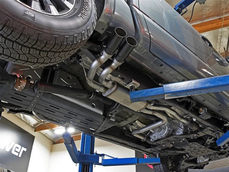 aFe POWER Rebel Series 2-1/2in 409 SS Cat Back Exhaust w/ Black Tips 16-17 Nissan Titan V8 5.6L - Side View