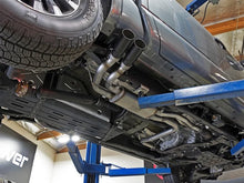 Load image into Gallery viewer, aFe POWER Rebel Series 2-1/2in 409 SS Cat Back Exhaust w/ Black Tips 16-17 Nissan Titan V8 5.6L - Side View