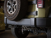 Load image into Gallery viewer, aFe Rebel Series 2.5in 409 SS Axle-Back Exhaust Polished 07-18 Jeep Wrangler (JK) V6-3.6L/3.8L - Installation View