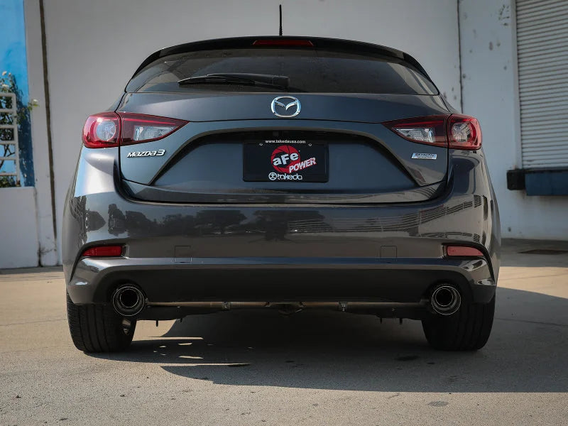 aFe Takeda 2-1/2in 304 SS Axle-Back Exhaust w/ Carbon Fiber Tips 14-18 Mazda 3 L4 2.0L/2.5L - Side View