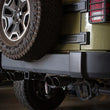 Load image into Gallery viewer, aFe Vulcan Series 2.5in 304SS Cat-Back Exhaust 07-18 Jeep Wrangler (JK) V6-3.6/3.8L w/ Black Tips - Side View