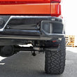 Load image into Gallery viewer, aFe Vulcan Series 3in 304SS Exhaust Cat-Back w/Blk Tip 2019 GM Silverado/Sierra 1500 L4-2.7L (t) - Side View