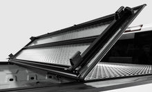 Load image into Gallery viewer, Access Access LOMAX Carbon Fiber Tri-Fold Cover 2004+ Ford F-150 - 5ft 6in Standard Bed ACCB5010019