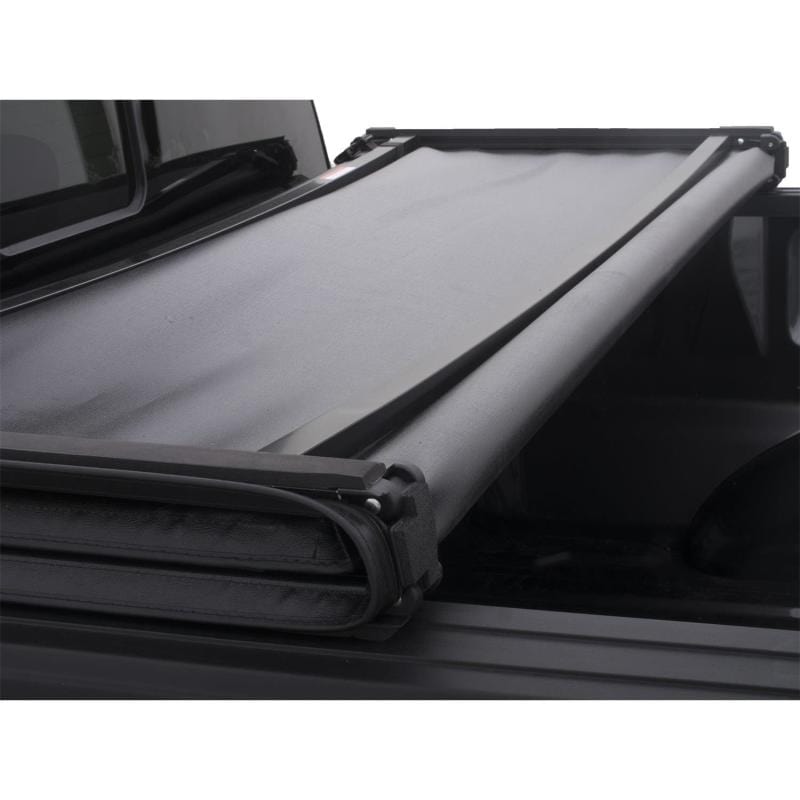 LUND Lund 15-18 Ford F-150 (5.5ft. Bed) Genesis Tri-Fold Tonneau Cover - Black LND950172