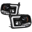 Load image into Gallery viewer, Spyder Auto (Spyder Signature) Projector Headlights - Version 2 - Light Bar DRL - Black 5084811 fits 2009-2010 Dodge Ram 1500 / 2009-2010 Dodge Ram 2500 / 2009-2010 Dodge Ram 3500 / 2011-2018 Ram 1500 / 2011-2016 Ram 2500 / 2011-2016 Ram 3500