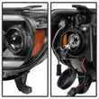 Load image into Gallery viewer, Spyder Auto (Spyder Signature) Projector Headlights - Light Bar DRL - Black 5081711 fits 2012-2015 Toyota Tacoma
