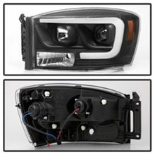 Load image into Gallery viewer, Spyder Auto (Spyder Signature) Projector Headlights - Version 2 - Light Bar DRL - Black 5085306 fits 2006-2008 Dodge Ram 1500 / 2006-2009 Dodge Ram 2500 / 2006-2009 Dodge Ram 3500