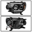 Load image into Gallery viewer, Spyder Auto (Spyder Signature) Projector Headlights - Light Bar DRL - Black 5081711 fits 2012-2015 Toyota Tacoma