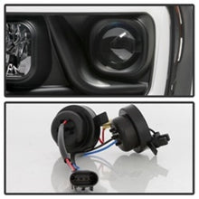 Load image into Gallery viewer, Spyder Auto (Spyder Signature) Projector Headlights - Version 2 - Light Bar DRL - Black 5085306 fits 2006-2008 Dodge Ram 1500 / 2006-2009 Dodge Ram 2500 / 2006-2009 Dodge Ram 3500