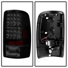 Load image into Gallery viewer, Auto LED Tail Lights Black Smoke 5078001 fits 2000-2006 Chevrolet Suburban 1500 / 2000-2006 Chevrolet Suburban 2500 / 2001-2006 Chevrolet Tahoe / 2000-2006 GMC Yukon DENALI / 2001-2006 GMC Yukon Xl 1500 DENALI / 2000-2006 GMC Yukon Xl 2500