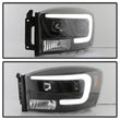 Load image into Gallery viewer, Spyder Auto (Spyder Signature) Projector Headlights - Version 2 - Light Bar DRL - Black 5085306 fits 2006-2008 Dodge Ram 1500 / 2006-2009 Dodge Ram 2500 / 2006-2009 Dodge Ram 3500