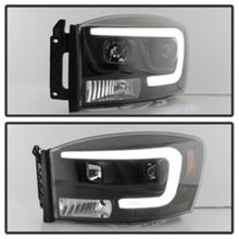 Load image into Gallery viewer, Spyder Auto (Spyder Signature) Projector Headlights - Version 2 - Light Bar DRL - Black 5085306 fits 2006-2008 Dodge Ram 1500 / 2006-2009 Dodge Ram 2500 / 2006-2009 Dodge Ram 3500