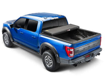 Load image into Gallery viewer, Extang 16-23 Nissan Titan XD w/o Rail Sys. (6ft. 7in. Bed) Solid Fold ALX