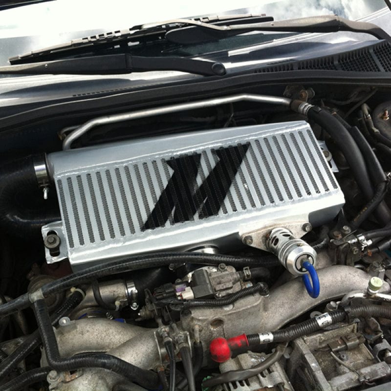 Mishimoto Mishimoto Subaru 02-07 WRX/04-07 STi Top-Mount Intercooler Kit - Powder Coated Black & Red Hoses MISMMTMIC-WRX-01BKRD